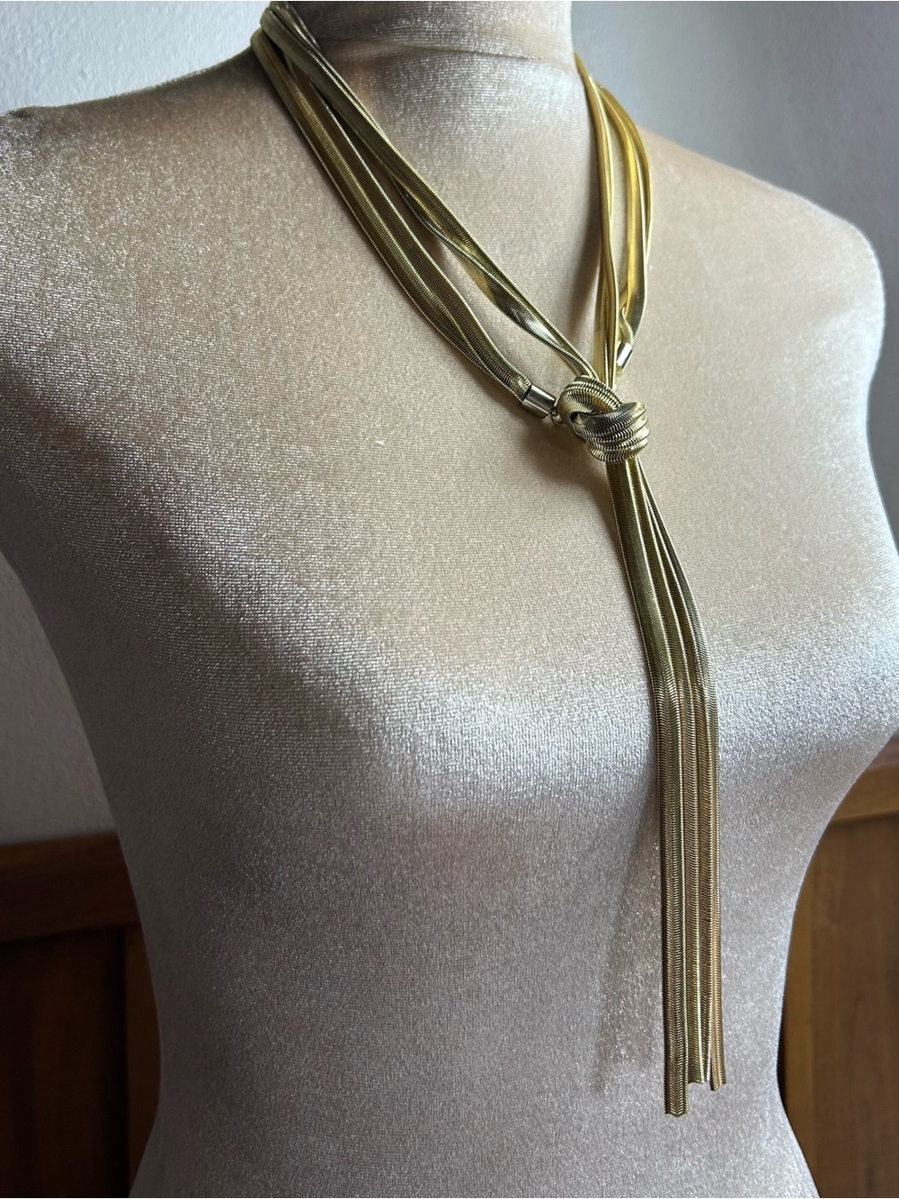 Express Multi Strand Knot Tassel gold tone Necklace